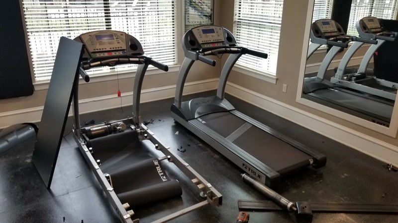TRUE treadmill torn apart for repair by Fitness Repair Xperts