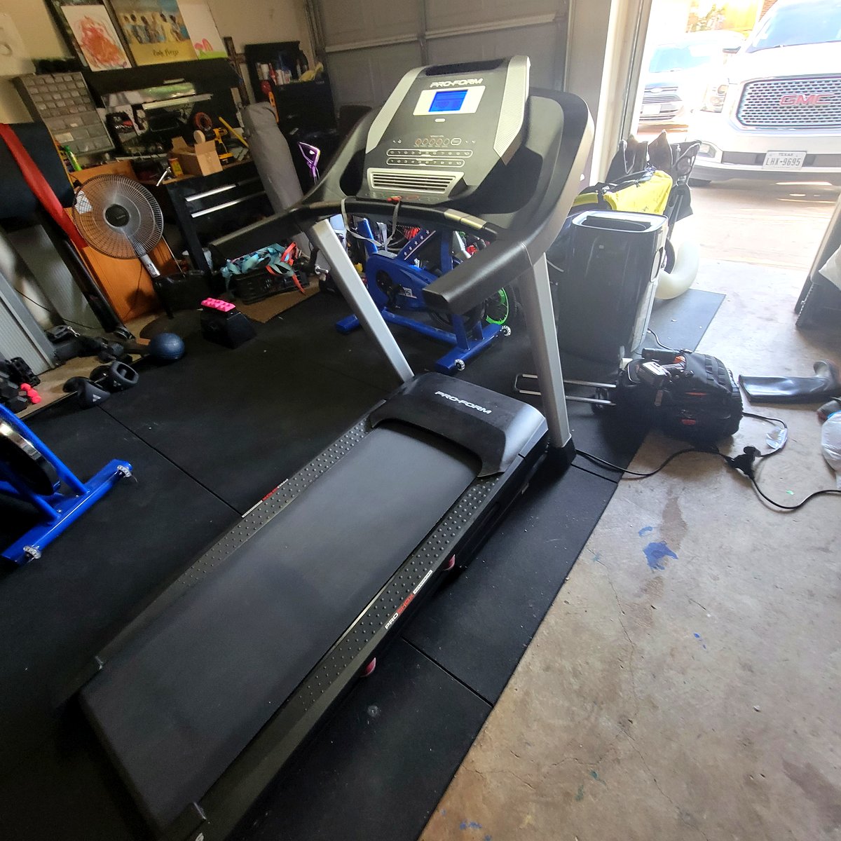 Treadmills and equipment in workshop for repair